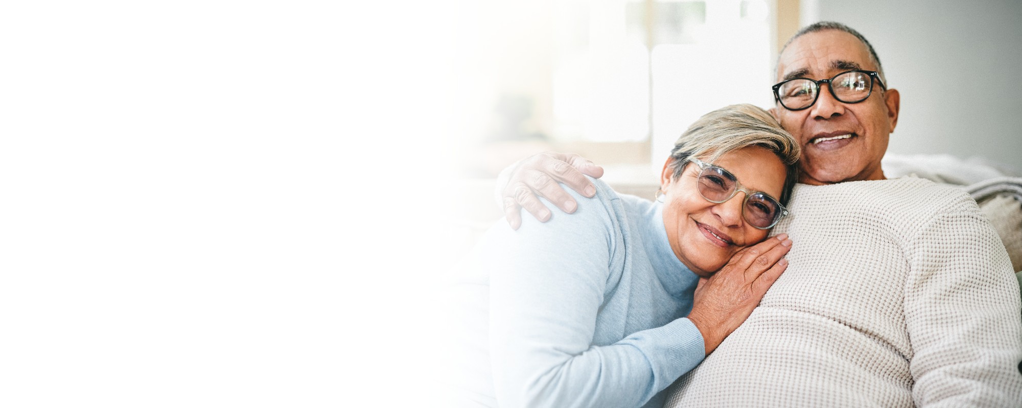 Senior couple cozy close embrace couch = Contact Us Senior couple cozy close embrace couch = Contact Us